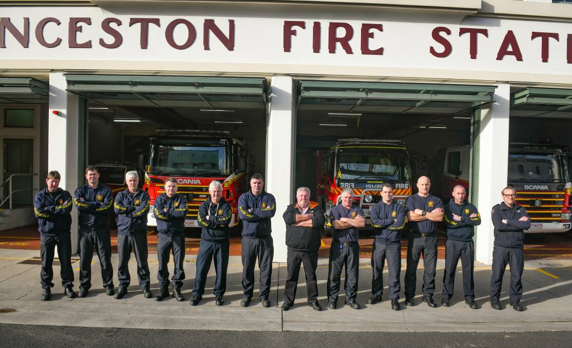 ANGRY: Firefighters union members in Launceston on Wednesday. Picture: Paul Scambler