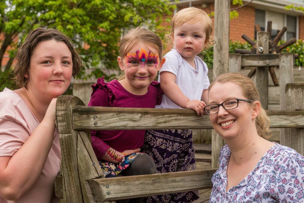 CELEBRATING: Rebecca Maidment and Walker House manager Jessica Cute with Mia Adams, 5, and Juno Hewer-Briscoe, 18 months, at the Walker House 25-year celebration event. Picture: Phillip Biggs