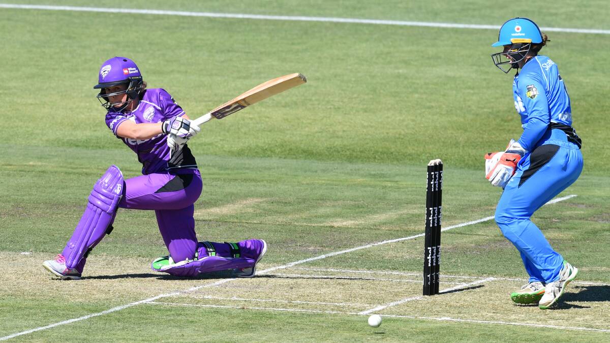 Sweeping: Corinne Hall of the Hobart Hurricanes bats during the Women's Big Bash League cricket match between the Hurricanes and the Strikers in Glenelg. Picture: AAP
