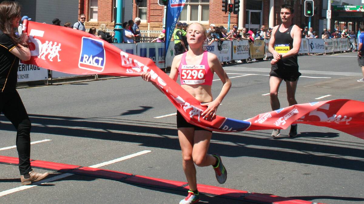 New female record: Abbie Butler held off Burnie's Charli Kay to win the 5km race. Picture: Supplied. 