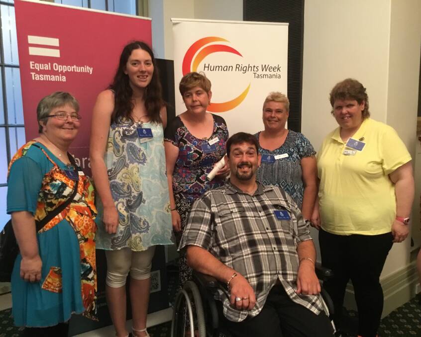WINNERS: Speak Out self advocates celebrate after winning the Tasmanian Human Rights Organisation  Award at Parliament House in Hobart. Picture: Supplied
