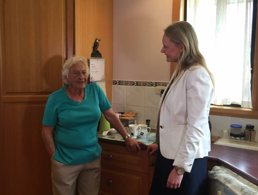 DOWNSIZING: National Seniors Australia local branch president Shirley Kirkby and Bass Liberal MHA Sarah Courtney discuss the pledge at Ms Kirby's home. Picture: Tess Brunton
