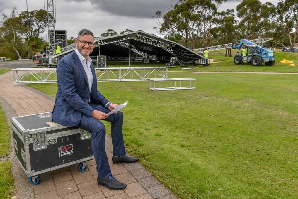 FESTIVAL: Country Club Tasmania's Bede Clifton watches the stage go up for the Red Hot Summer Tour at the club. Picture: Paul Scambler
