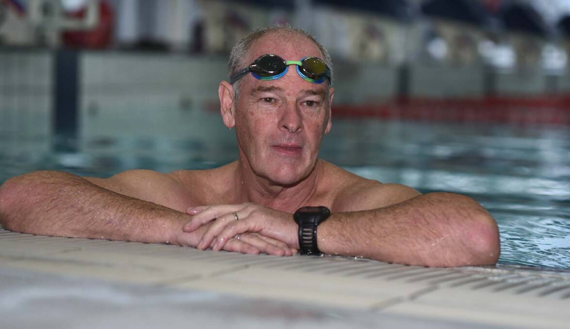 BIG SWIM: Kim White and his team plan to donate any fundraised money to Muscle Dystrophy Tasmania, earmarking it to help people diagnosed with the disease. Picture: Neil Richardson