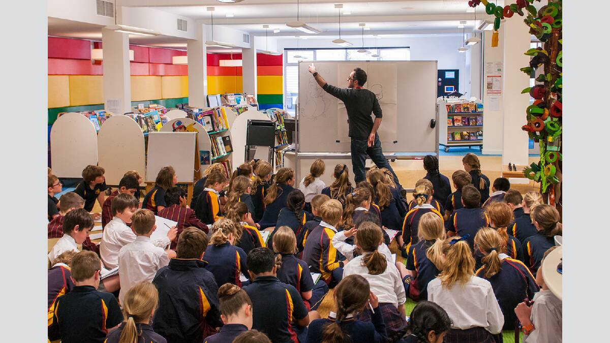 The Examiner photographer Phillip Biggs captures the eager young illustrators at Scotch Oakburn College junior school learning the tricks of the trade from James Foley, who illustrated zombie rabbit book 'My Dead Bunny'. The book was shortlisted at the The Children's Book of the Year Awards.