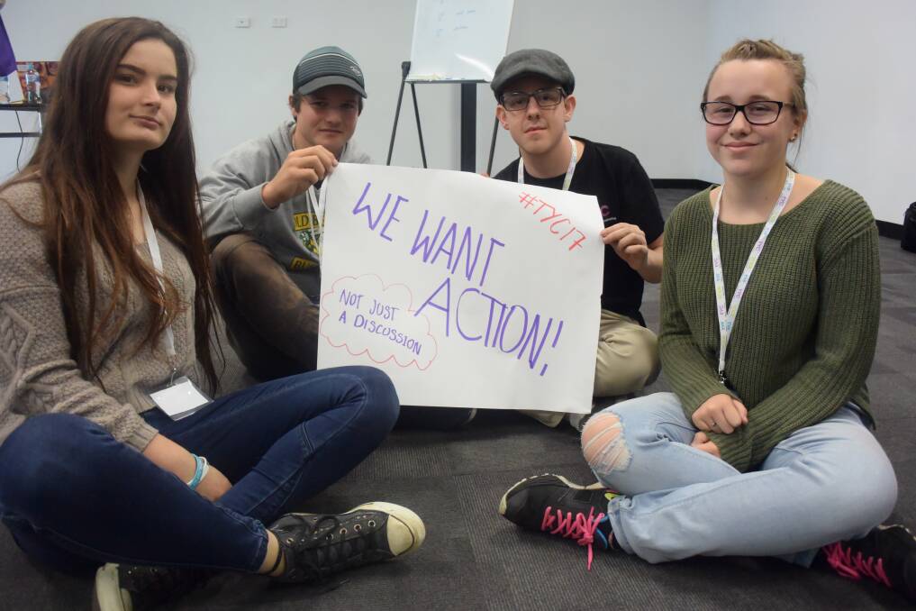 YOUTH UNITE: Amy Brant, 17, Rhys Burr, 15, Dakoda Leary, 18, and Kiarna Nibbs, 14, say it's time for action, leave out the distraction at the Tasmanian Youth Conference on Thursday. Picture: Tess Brunton