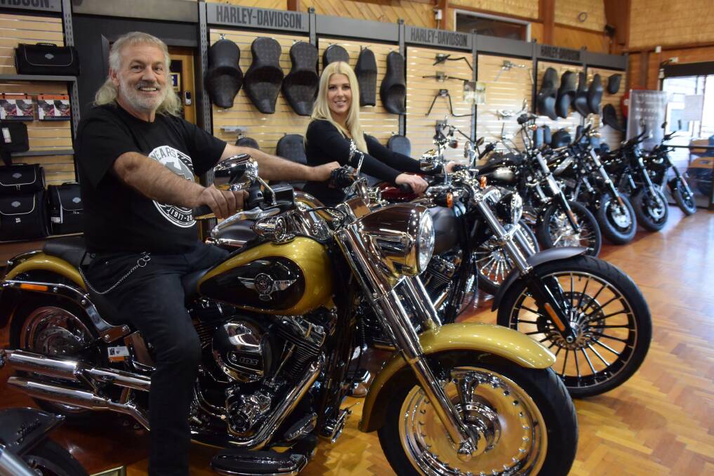 START YOUR ENGINES: Richardson's Harley-Davidson dealership owner Simon Hrycyszyn, and events and promotions coordinator Lindelle Banks prepare for the Thunder Ride on Saturday. Picture: Tess Brunton