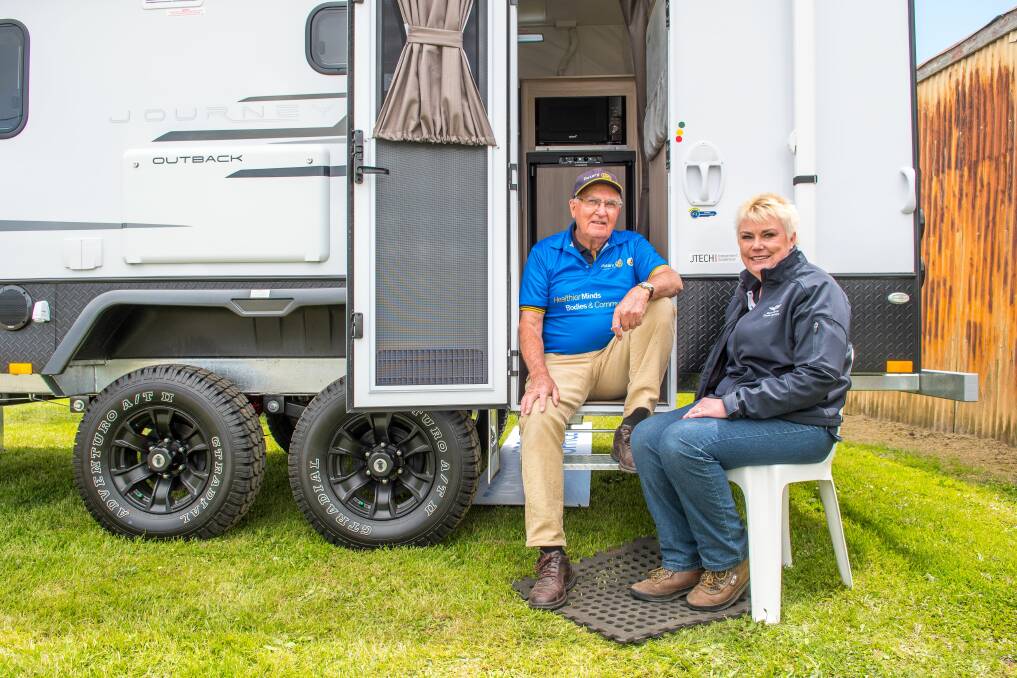 CARAVANS OF COURAGE: Australian Rotary Health chairman John Dare and the Royal Flying Doctor Service's Nicole Grose have a yarn about the Muster for Mental Health. Picture: Scott Gelston