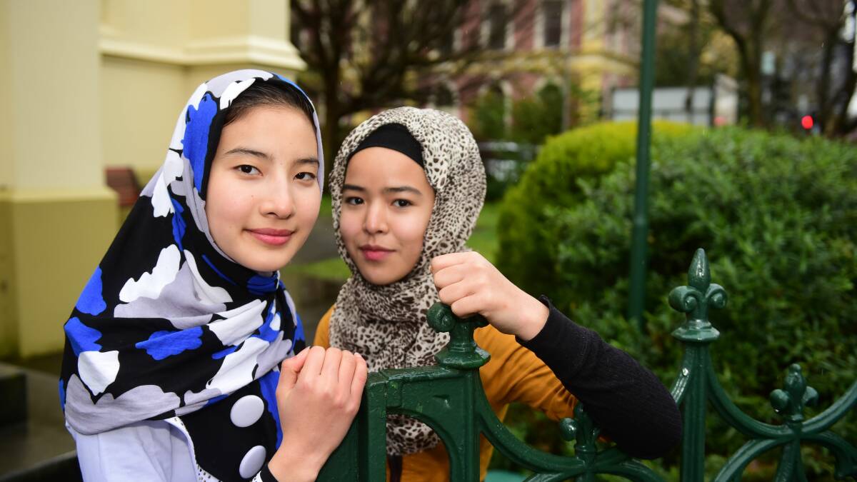 Kings Meadows High School students Zahra Rezaei, 15, and Fatemeh Nourouzi, 16, are ready to tell their stories. Picture: Paul Scambler