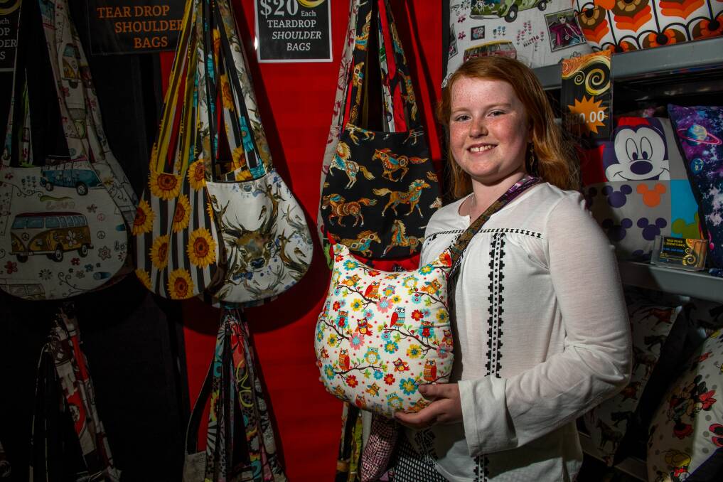 BUDDING ARTIST: Twelve-year-old Chloe Steuart is the youngest stallholder with her Twin Peaks Cushions and Bags stall and won a special encouragement award. Picture: Scott Gelston