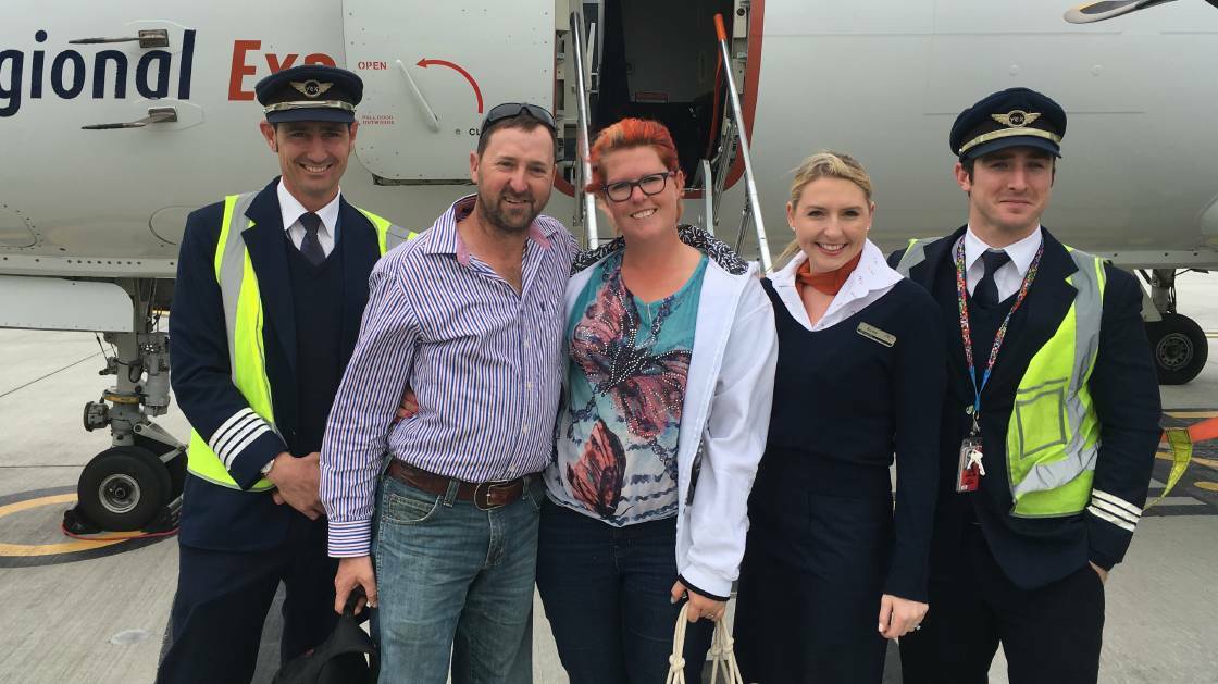 ENGAGED: Captain Dominic Inman, Jason Pearce, Tiffany Jones with Captain Dominic Inman, flight attendant Brydie Fraser and first officer Jack Trentin. Picture: Rex media
