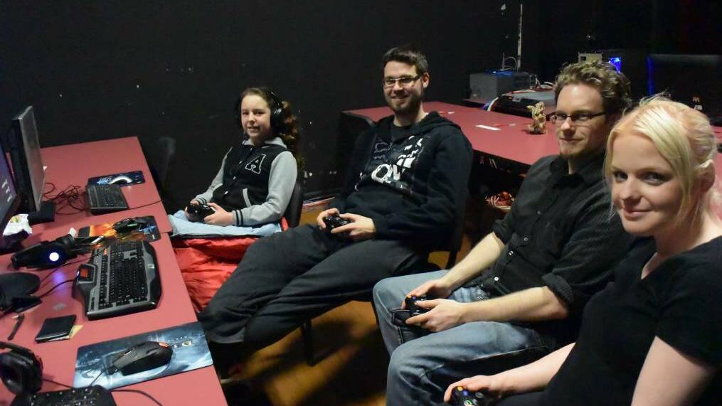 FUN AND GAMES: Warrnambool gamers, from left, Daveigh Brown, Andrew Dart, Nathan Holcombe and Jacinta Altmann attended the 24-hour LAN of the Damned computer gaming event. Picture: Madeleine McNeil
