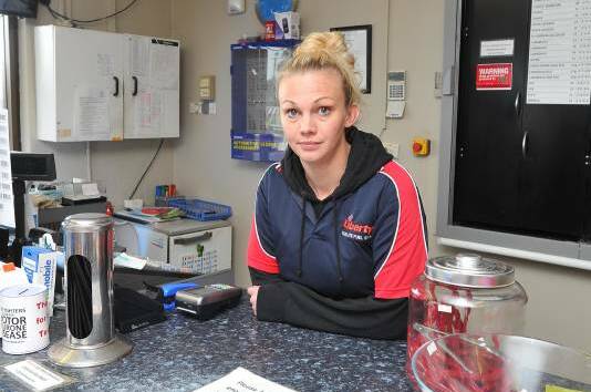 Alison Williams was threatened by an armed bandit on Sunday night in a robbery which saw her boss stabbed in the shoulder.