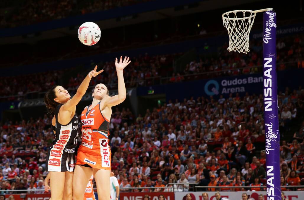 OUT OF REACH: Layton looks to spoil Giants shooter Jo Harten at last weekend's game. Picture: Getty Images.