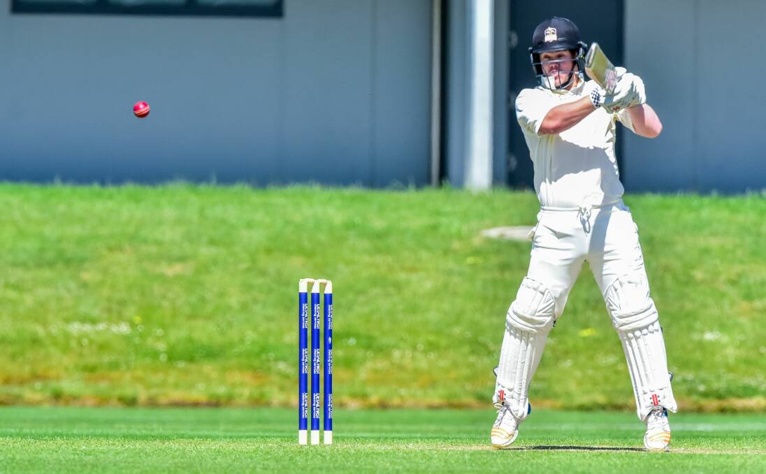 DECISIVE: Raiders batsman Jake Williams launches a cracking square cut on Saturday at Windsor Park against Glenorchy. Pictures: Neil Richardson