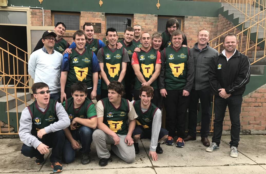 PRIDE: Tasmania's AFL inclusion team that is heading to the national carnival wear the Map after their guernsey presentation at the NTCA Ground on Sunday. Picture: Supplied.
