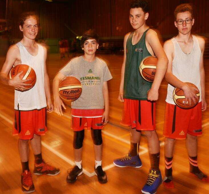 READY TO SHINE: Launceston junior basketballers Jack Wood, Zaci Anis, Elijah Agaiava and Jarvis Henderson during state training at Elphin Sports Centre. Picture: Scott Gelston