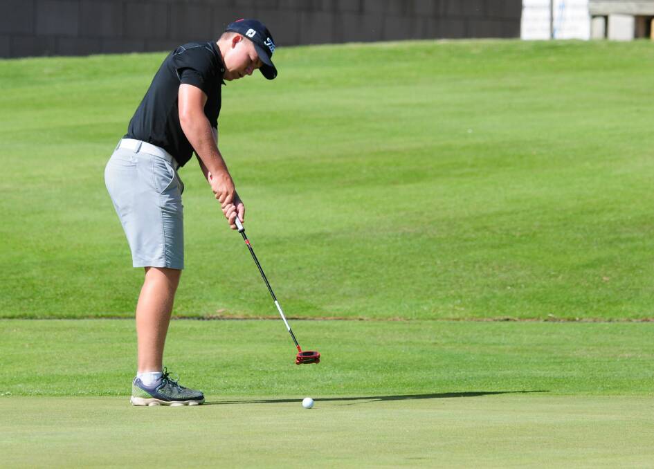 EASY PUTT: Tasmanian Golf Club player Timothy Smith looks to tap in. 