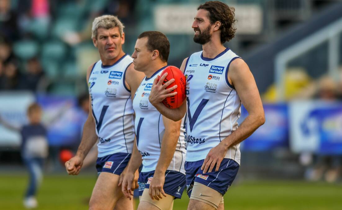 STRUTTING AWAY: Ex-West Coast and Hawthorn player Matt Spangher is joined by former Sydney star Jared Crouch and one-time Kangaroo and Demon Shaun Smith. Picture: Phillip Biggs.