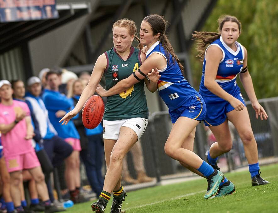 QUEEN KING: Hot AFLW prospect Mia King displays her skills under pressure in one of the Tasmania Devils NAB fixtures this year ahead of Tuesday's draft. Picture: Jun Tanlayco