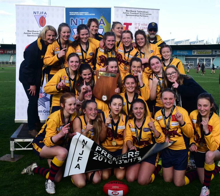 GIRLS YOUTH: East Launceston pose on the dais after claiming the first-ever NTJFA girls' premiership flag, defeating Evandale. Picture: Neil Richardson