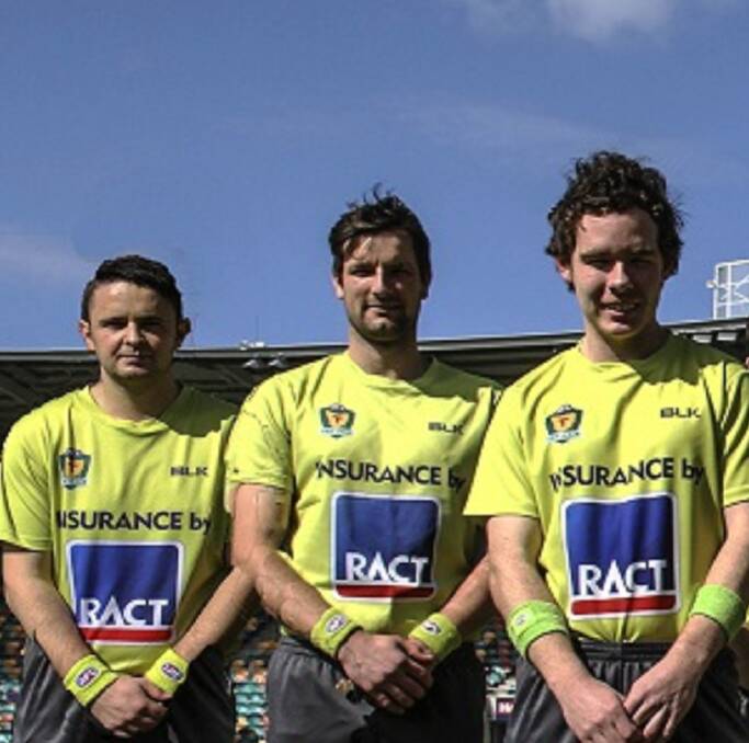 BLOW UP: 2015 TSL grand final field umpire Mark Tuckett (left) stands at one of his proudest football moments prior to the alleged assault at the weekend. Picture: AFL Tasmania