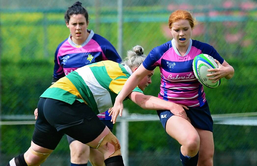HOT PROSPECT: Lauren Cooper shows a clean set of heels for Launceston Pink against North West Panthers in a Launceston sevens women's game earlier this year.