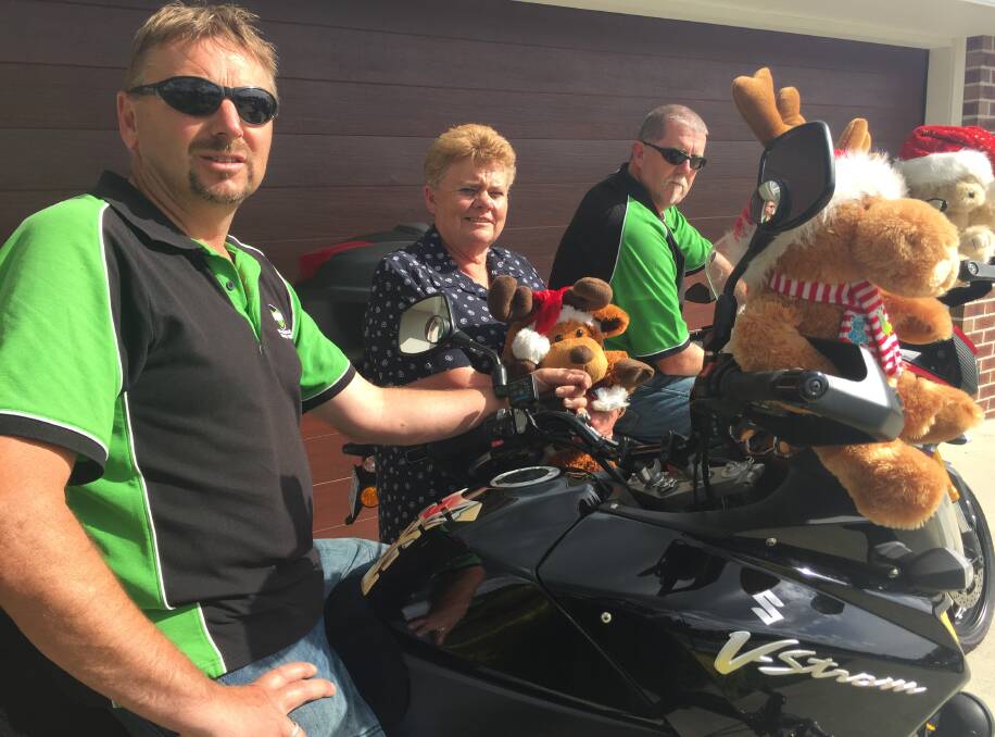 READY TO RIDE: Northern Motorcycle Riders Association members Danny Penney, Kim Brundle-Lawrence and Ian Cawthorn prepare for Saturday's annual Tasmanian Toy Run.