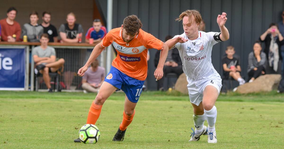 HEAD DOWN: Ex-Launceston City talent Aaron Campbell settles back into his Riverside colours against Glenorchy. 
