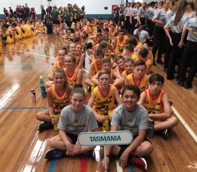 GO TEAM: Tasmania's nine under-14, 16 and 18 sides display their colours during the opening ceremony at the Australian Country Junior Cup in Albury. Picture: Tameka Oldham
