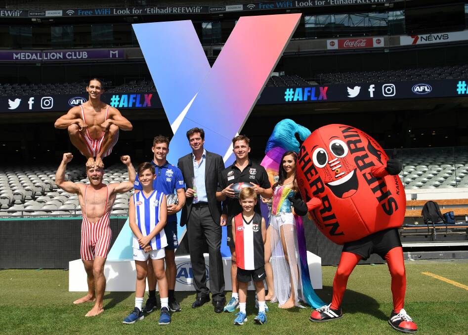 SHOWTIME: The flashy AFLX launch at Melbourne's Etihad Stadium was just too much for unimpressed footy fans to willingly mock the game's latest creation at the expense of a lack of money spent on Tasmanian football. Picture: AAP