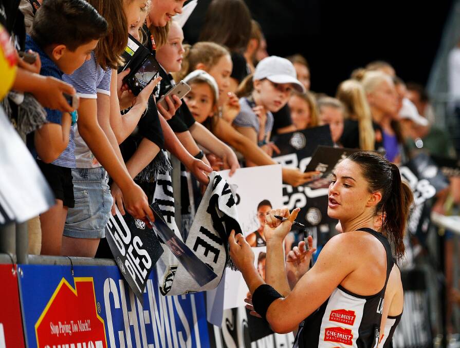 WHO'S NEXT?: The ever-popular Layton signs autographs for Magpies netball fans in Melbourne. Picture: Getty Images. 
