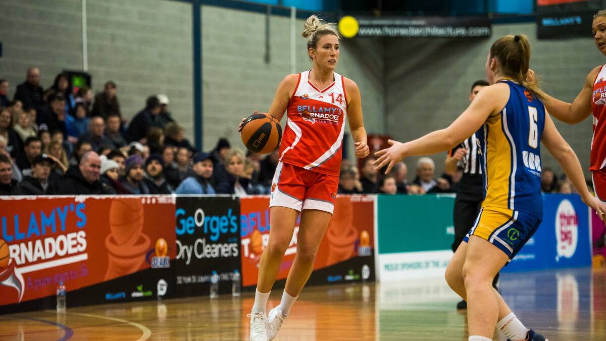 TOP OF HER GAME: Lauren Nicholson starred with 20 points to help the Tornadoes to a hard-fought win over the Canberra Capitals.