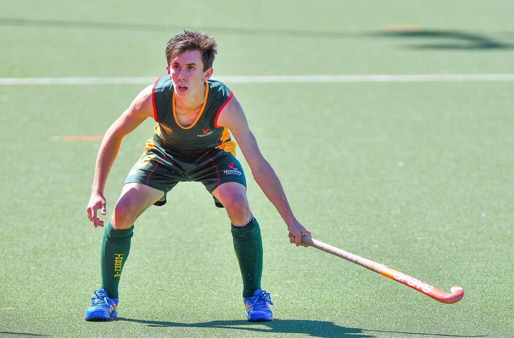 DAZED: Launceston teen Josh Commins before his fall while playing for Tasmania on Saturday at the Northern Hockey Centre. Picture: Phillip Biggs