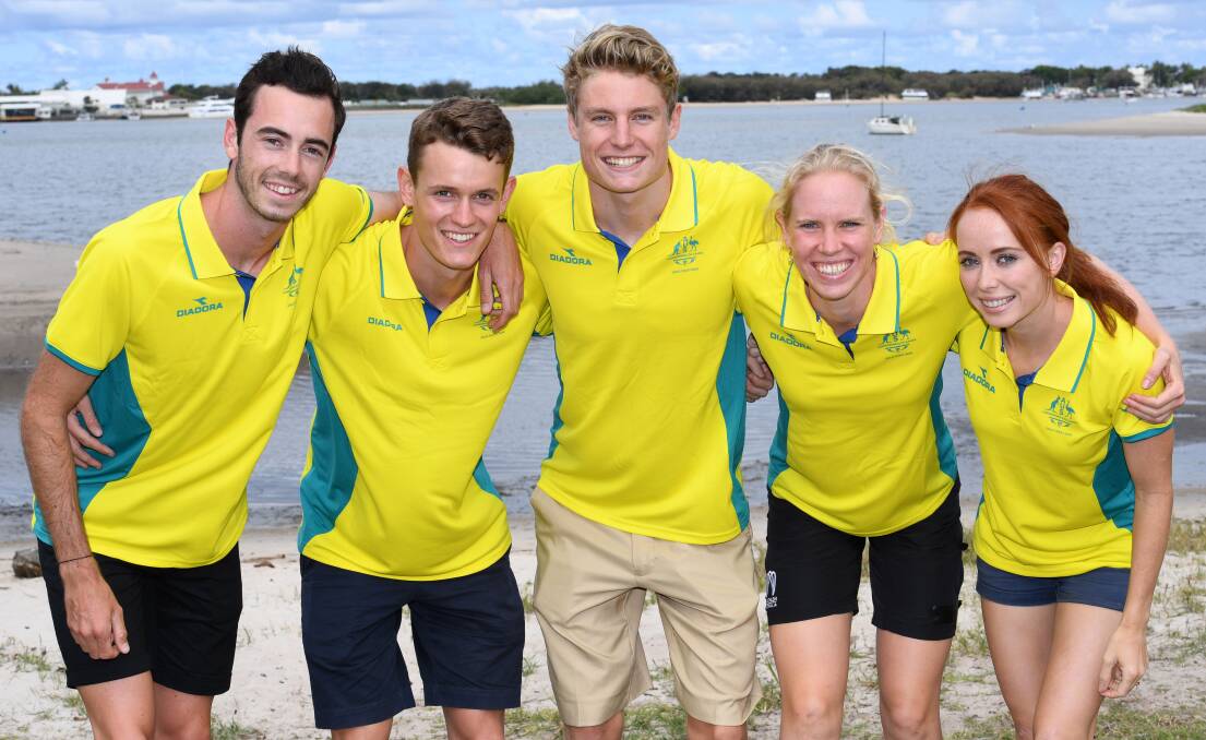 GREEN AND GOLD: Star Launceston triathlete Jake Birtwhistle, left, joins Australian teammates on the Gold Coast ahead of the Commonwealth Games. Picture: Delly Carr 