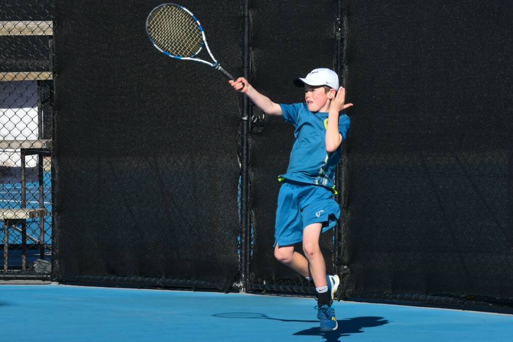 GOOD TOUCH: Launceston junior Alex Martin shows off his forehand at the Launceston Regional Tennis Centre on Saturday. Pictures: Neil Richardson