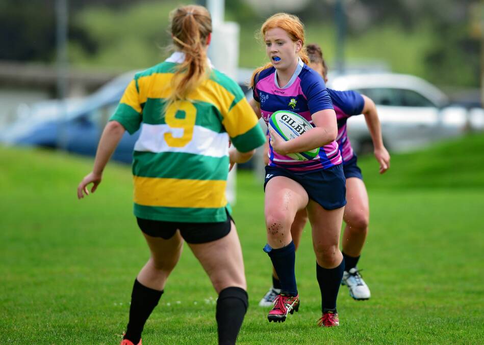 FULL ON: Lauryn Cooper playing for Launceston last year gets her first taste of seven-a-side rugby before debuting for UTAS Lions next month on home turf. Picture: Phillip Biggs