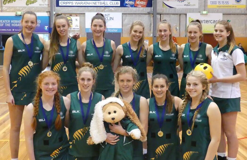 WE'RE READY: Tasmania's 15-and-under squad finish final preparations for the nationals in Adelaide in Hobart after winning a state under-17 tournament last week.