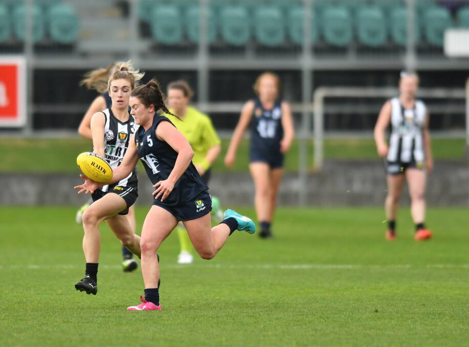 MAKING THE RUNS: Launceston's Courtney Webb may have to decide to play for either a Tasmanian Kangaroos AFLW side or the Tasmanian Roar in cricket. Picture: Scott Gelston