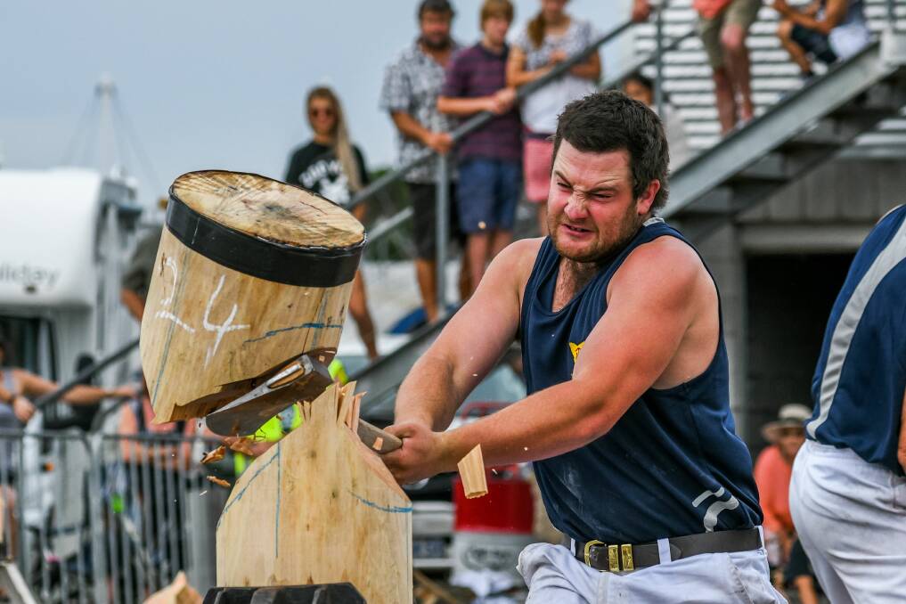 TIMBER: Queensland state champion Jack Argent chops his way through the block swiftly.