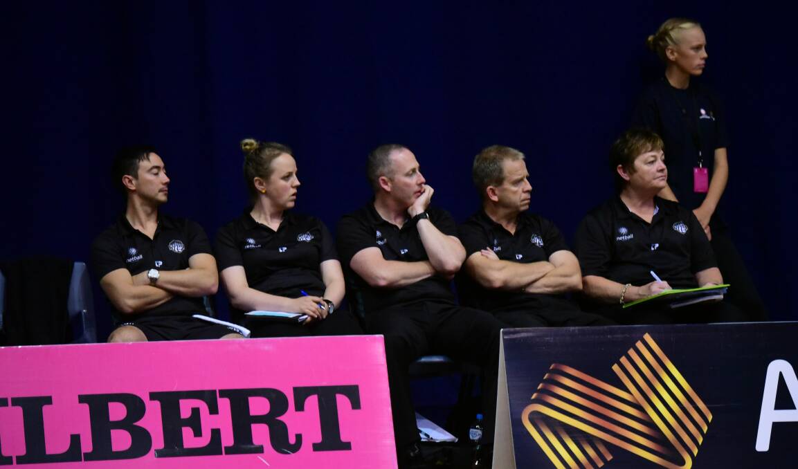 JUDGEMENT: Pidgeon, middle, sits next to Tasmanian Magpies head coach Jon Fletcher on the bench at the Silverdome in March. Picture: Paul Scambler