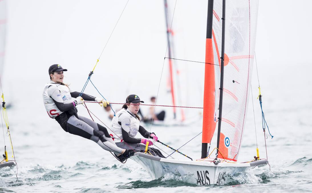 THIS WAY: Launceston teenager Chloe Fisher leads the charge out front with her Sandy Bay clubmate sailing partner Jasmin Galbraith during their bronze-medal win at the youth world titles in China. Picture: Tomas Moya