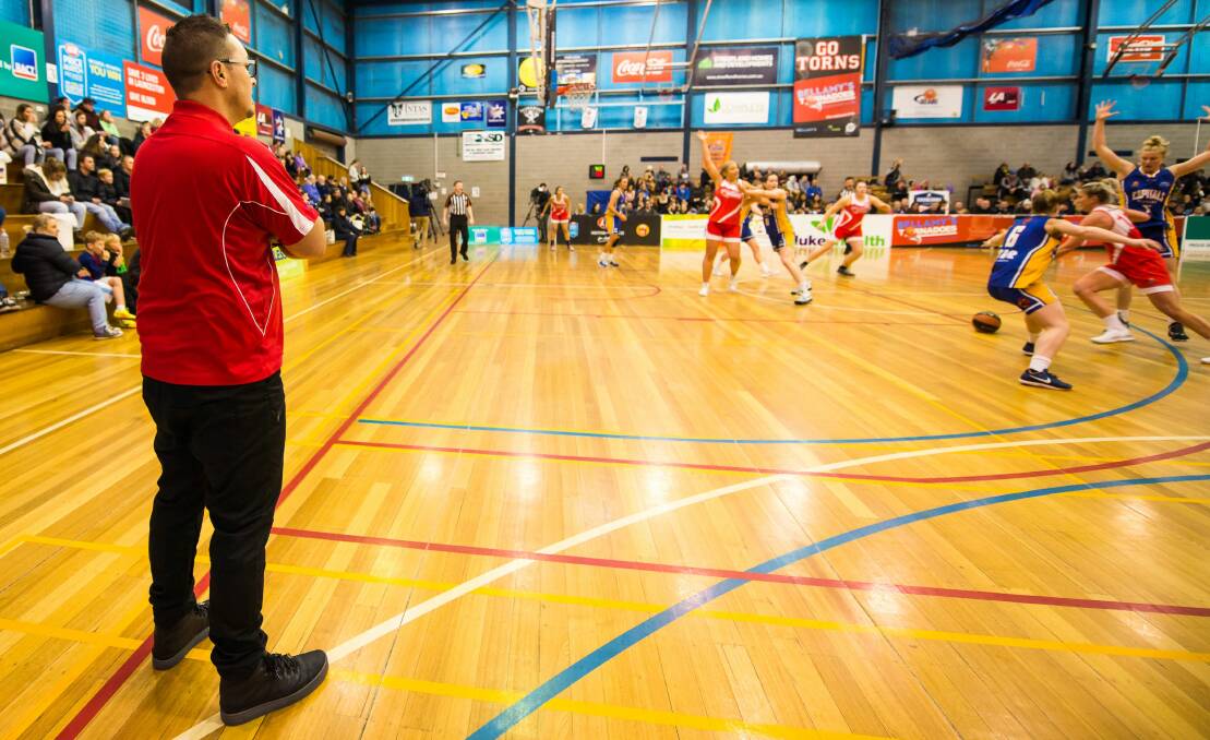 WATCHFUL: Launceston coach Richard Dickel casts an eye over his Tornadoes during their last start against Canberra at Elphin Sports Centre. Picture: Scott Gelston