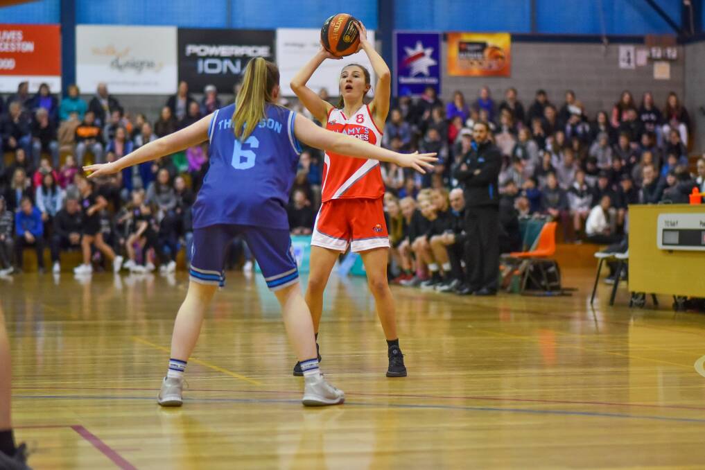 ON THE ATTACK: Rebecca Abel looks to pass to the Torns forward against Hobart Chargers. Picture: Scott Gelston