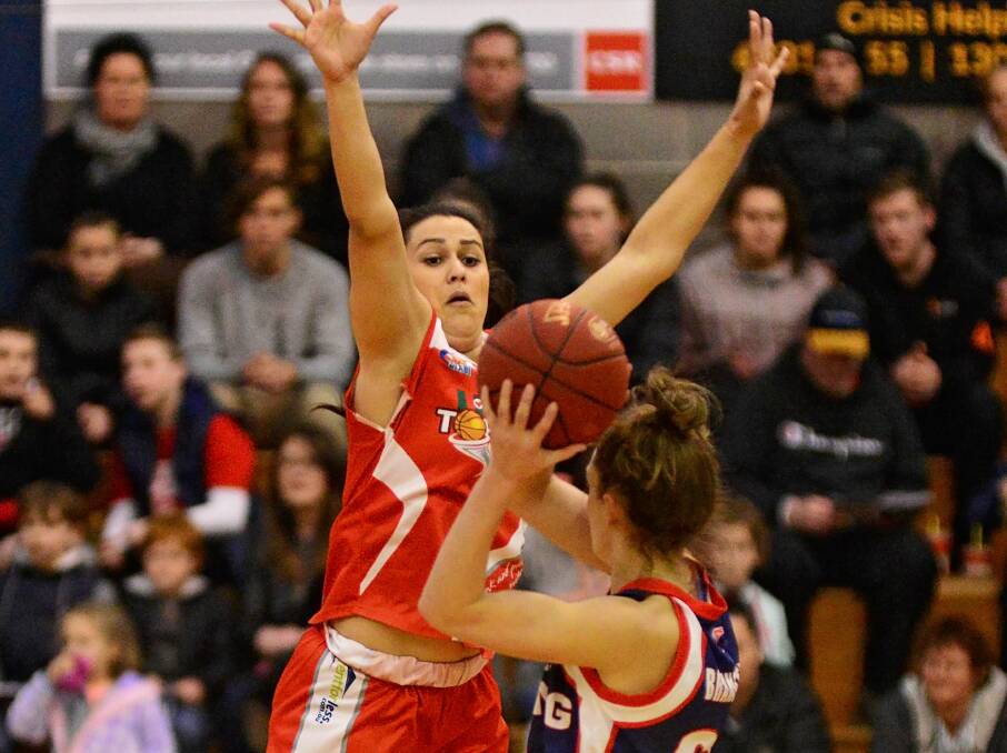 DEFENCE: The Torns' Ally Wilson looks to block an Isabella Brancatisano pass in the fierce SEABL encounter in Launceston on Saturday night.