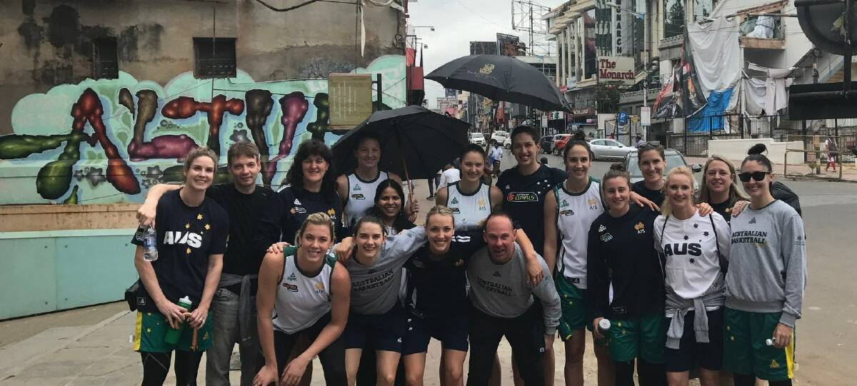 OPAL FIND: The Australians including Lauren Mansfield, fifth from the right, make themselves at home on arrival in Bangalore, India. Picture: Basketball Australia