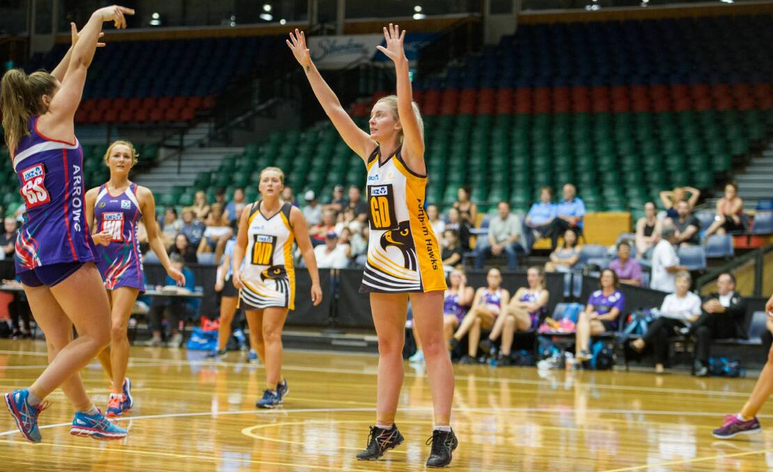 HANDS UP: Hawks defender Dannielle Devlin looks to stop the Arrows high pass.