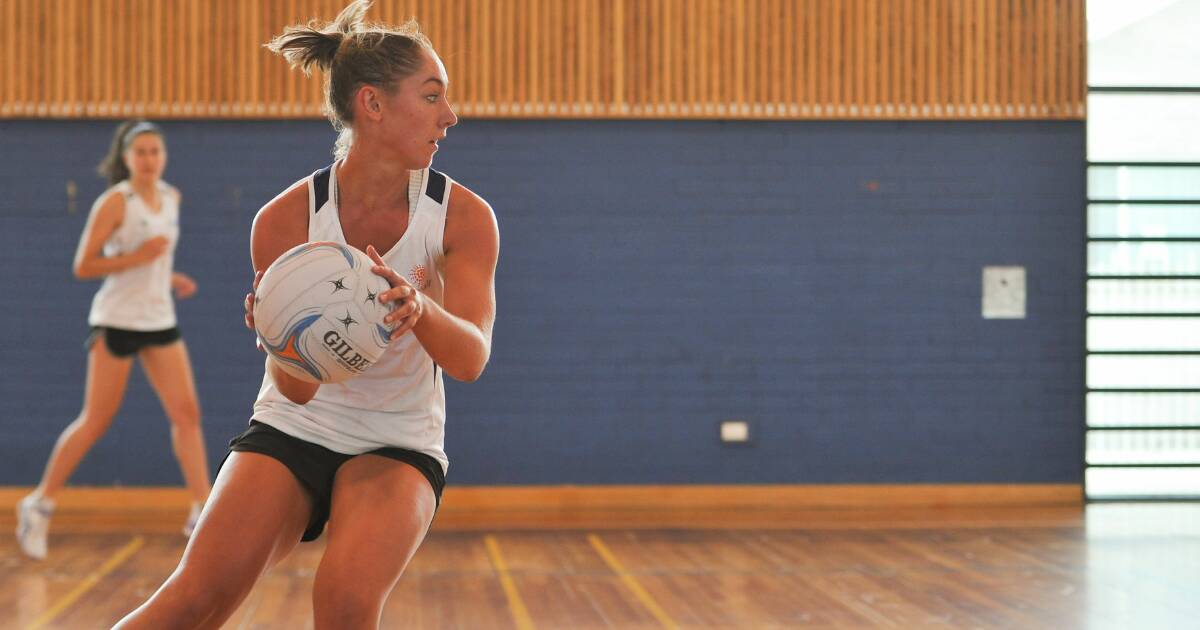 HARD WORK: Launceston netballer Shelby Miller receives a pass during the Tasmanian Magpies' first training session in Launceston on Saturday morning. Picture: Scott Gelston