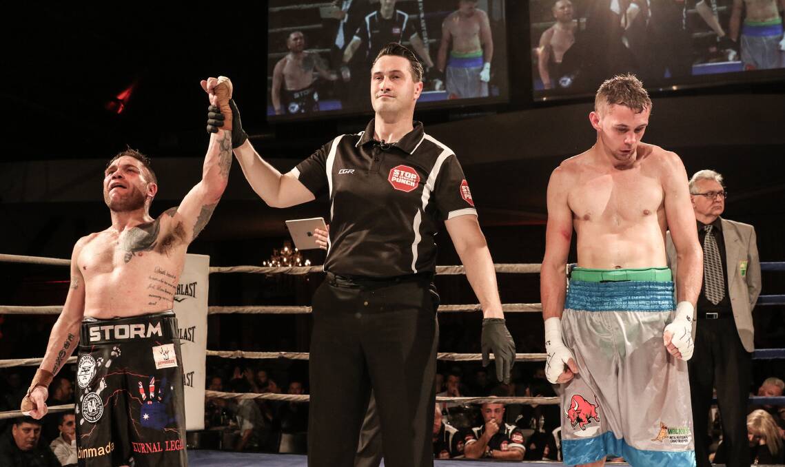 COURAGE: The referee raises the hand of Thomas in his knockdown win over Sam Williams. Picture: Marty's Knockout Photography.