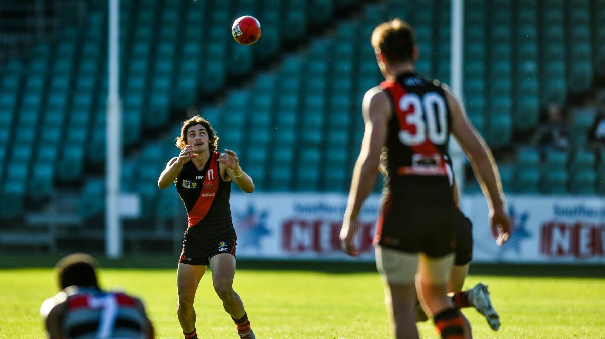 EYES ON THE BALL: Northern Bomber Jay Lockhart will be put through his paces in front of keen AFL watchers. 